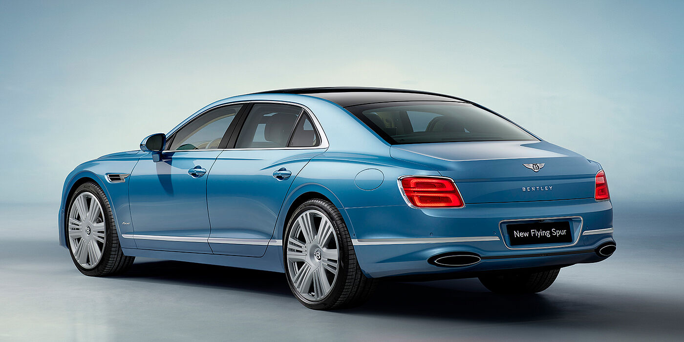 Bentley Santiago New Bentley Flying Spur Azure sedan rear view in Light windsor blue by Mulliner paint with 22 inch Azure wheels and chrome exterior details