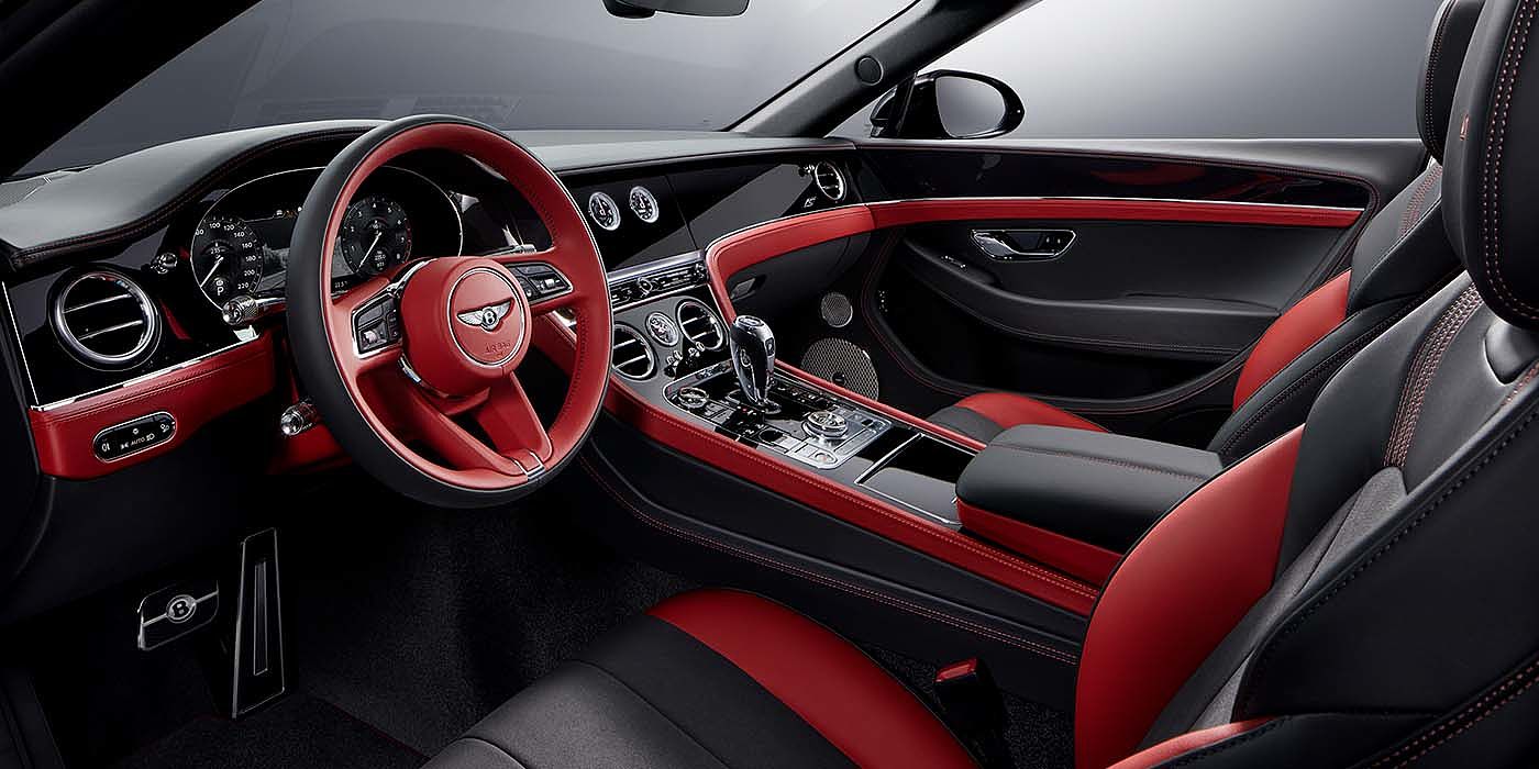 Bentley Santiago Bentley Continental GTC S convertible front interior in Beluga black and Hotspur red hide with high gloss carbon fibre veneer