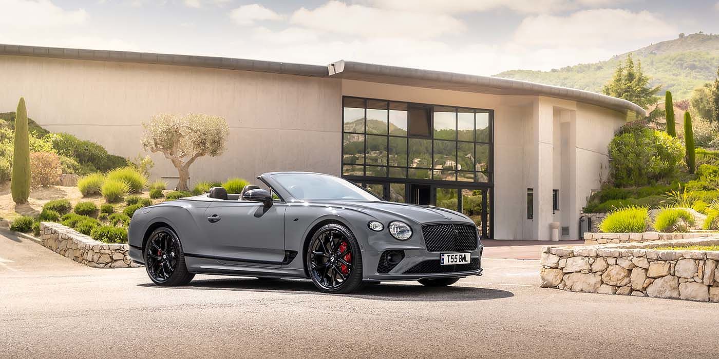 Bentley Santiago Bentley Continental GTC S convertible in Cambrian Grey paint front 34 static near house