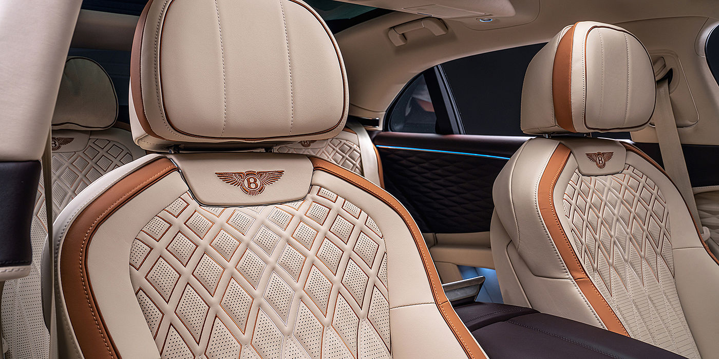 Bentley Santiago Bentley Flying Spur Odyssean sedan rear seat detail with Diamond quilting and Linen and Burnt Oak hides