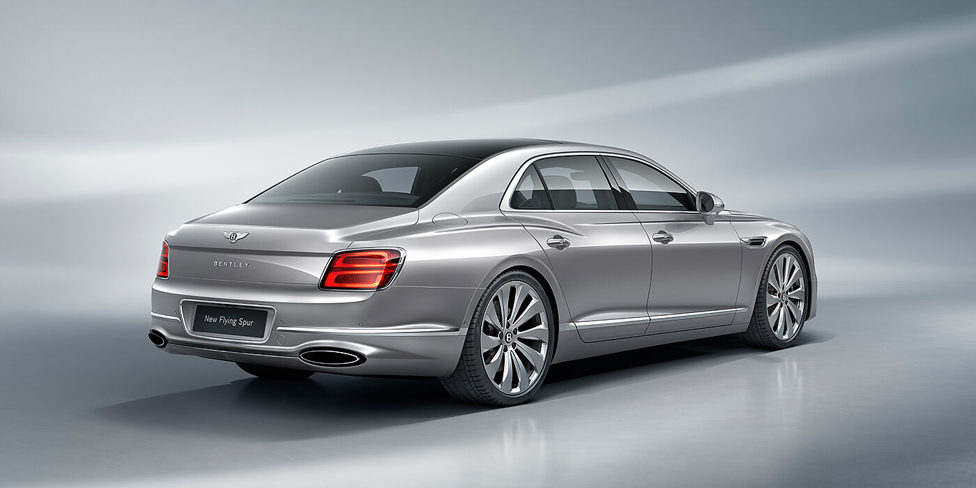 Bentley Santiago New Bentley Flying Spur sedan rear view in Silverlake paint with ten spoke wheels and chrome matrix grille