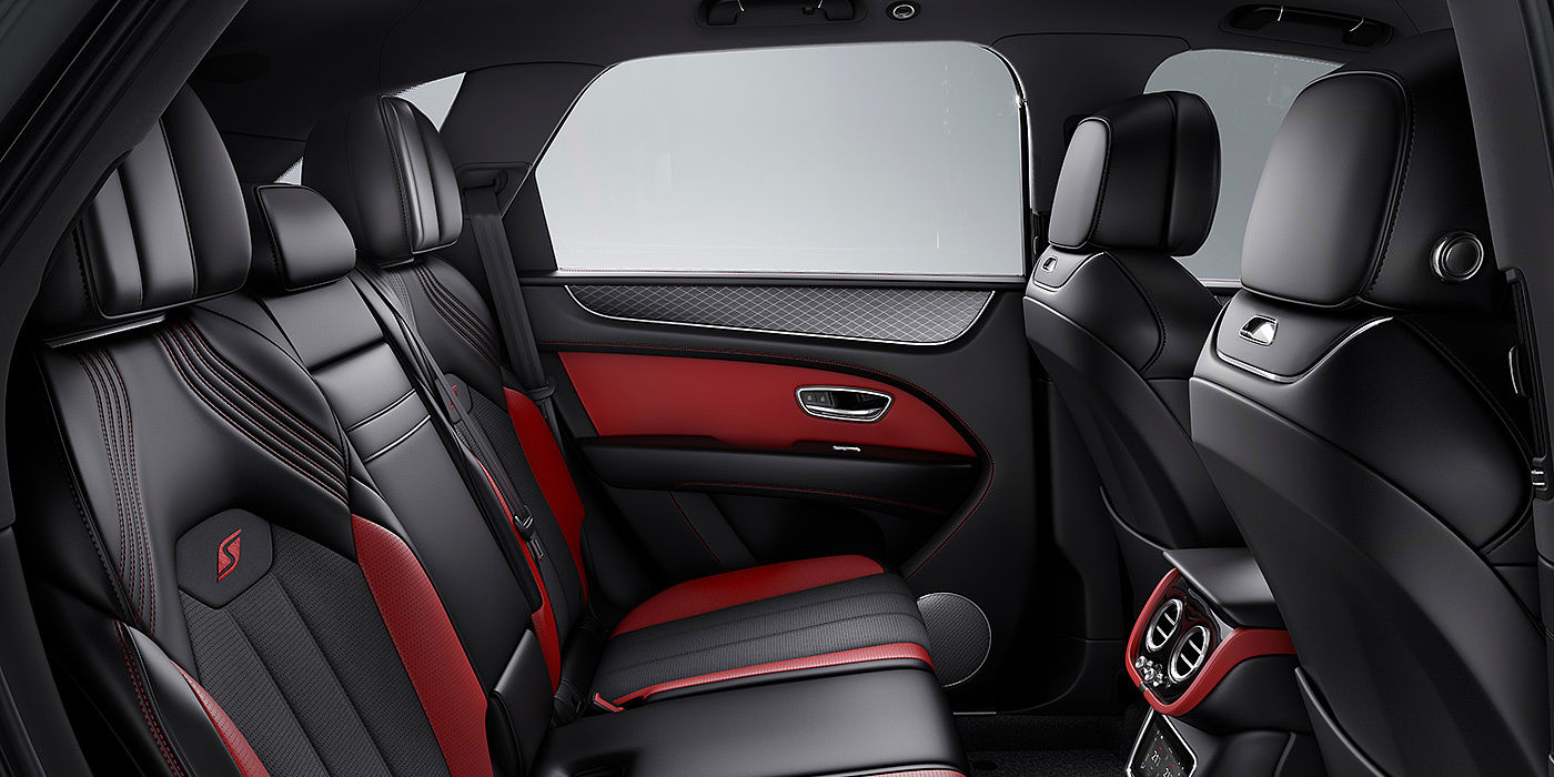 Bentley Santiago Bentey Bentayga S interior view for rear passengers with Beluga black and Hotspur red coloured hide.