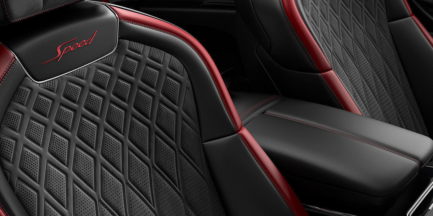 Bentley Santiago Bentley Flying Spur Speed sedan seat stitching detail in Beluga black and Cricket Ball red hide