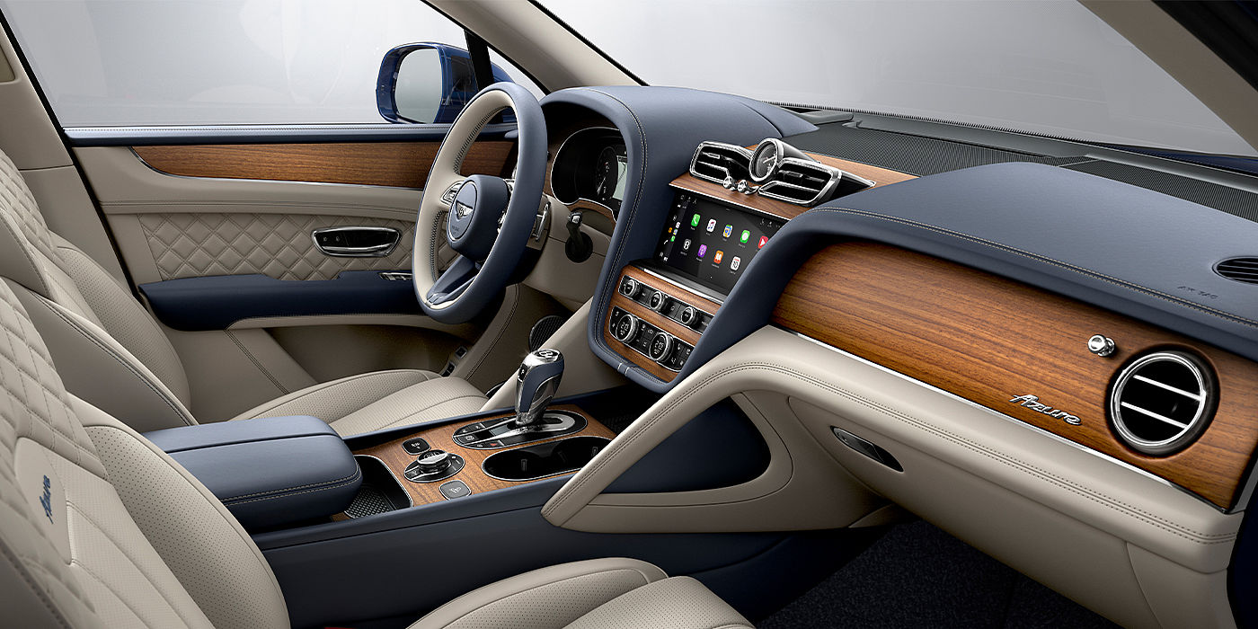 Bentley Santiago Bentley Bentayga Azure SUV front interior in Imperial Blue and Linen hide