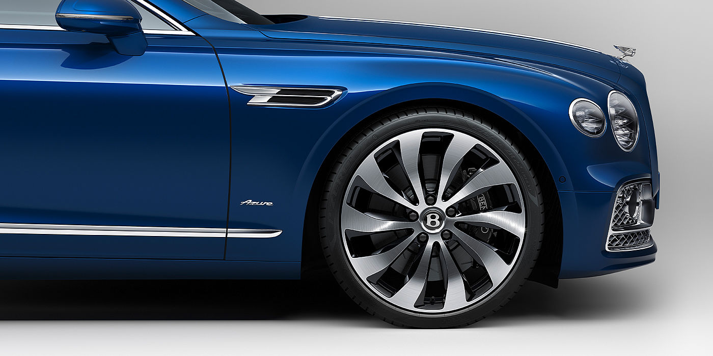 Bentley Santiago Bentley Flying Spur Azure sedan side close up in Sequin Blue paint with Azure badge