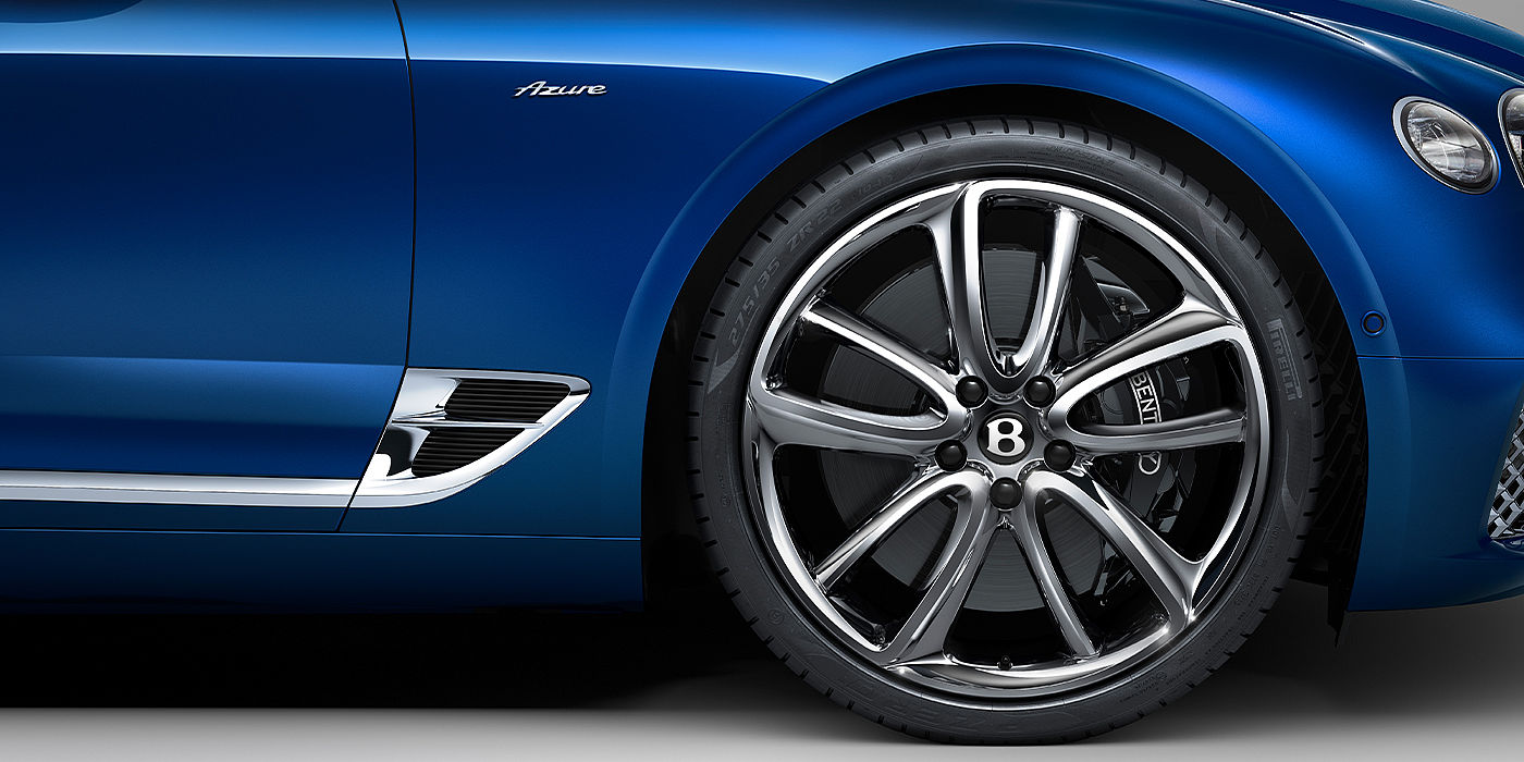 Bentley Santiago Bentley Continental GTC Azure convertible in Sequin Blue paint side profile with Azure badge close up